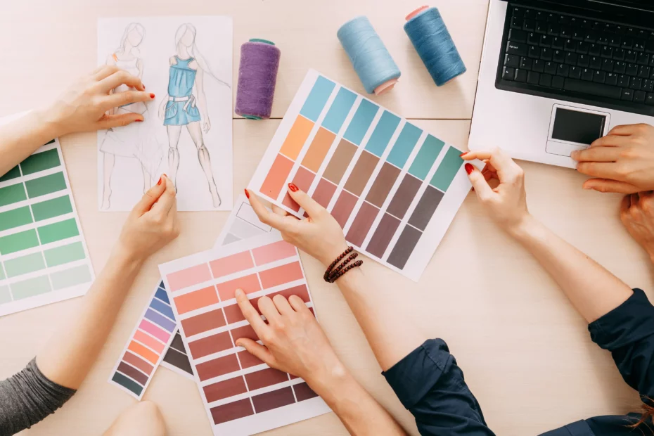 people holding colour watches in fashion studio