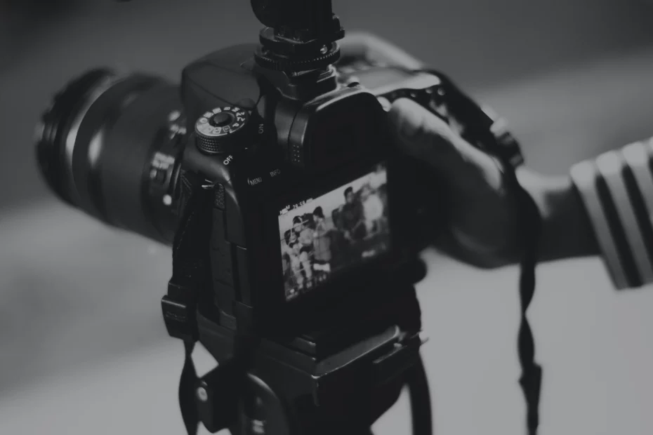photographer holding camera