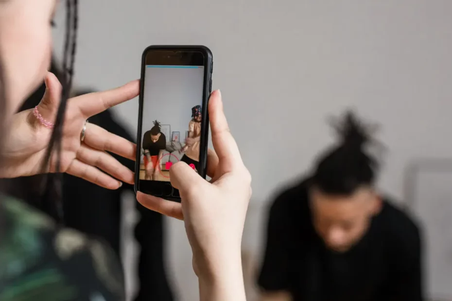 person taking a photo on a mobile phone