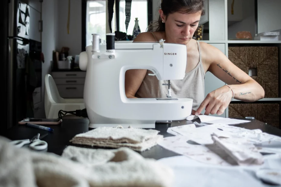 person working at sewing machine