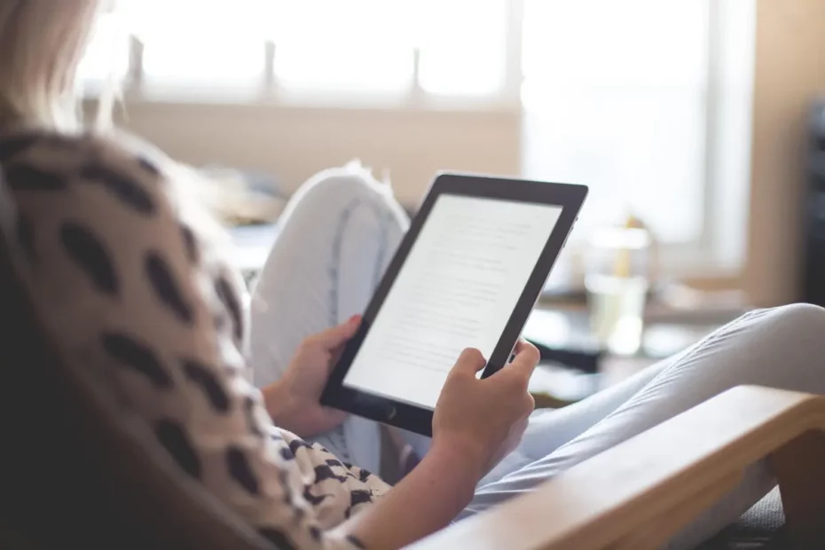 person sat viewing a tablet device